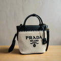 CROCHET TOTE BAG 23 IN BEIGE WOVEN RAFFIA WITH BLACK CALFSKIN STRAP